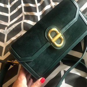 Small green suede handbag